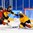 GANGNEUNG, SOUTH KOREA - FEBRUARY 20: Switzerland's Fabrice Herzog #61 goes down on a tripping penalty to Germany's Patrick Hager #50 in front of Danny Aus Den Birken #33 during qualification playoff round action at the PyeongChang 2018 Olympic Winter Games. (Photo by Matt Zambonin/HHOF-IIHF Images)

